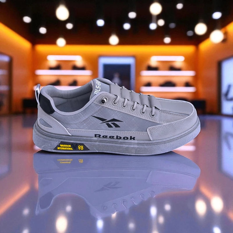 307 - Gray Reebok Sneakers with Accent and Sporty Design